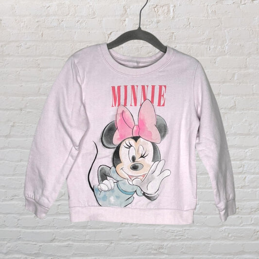 Pink sweatshirt featuring a large graphic of Minnie Mouse with pink bow and 'MINNIE' text on the front.