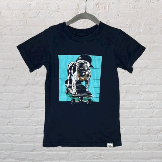 Black t-shirt featuring a graphic of a dog riding a skateboard with a gold chain and a hat.