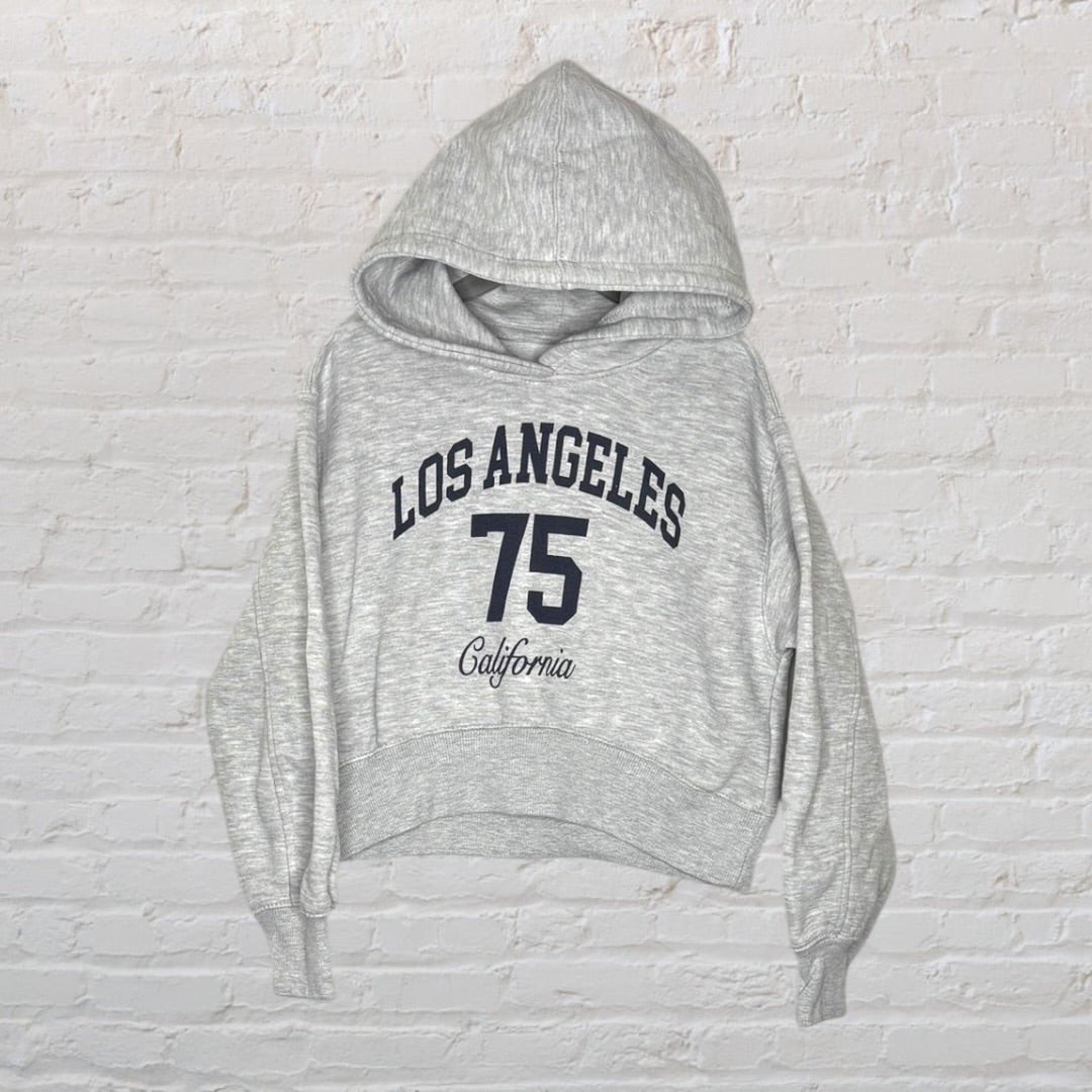 Gray hooded sweatshirt with 'Los Angeles 75 California' printed in navy blue on the front.