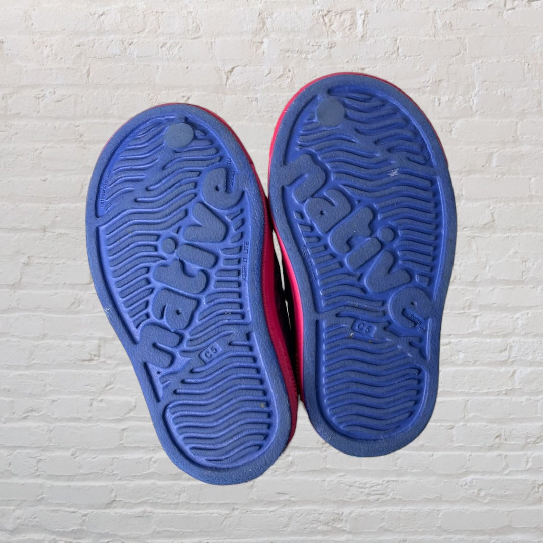Blue and pink gradient slip-on perforated shoes by Native with a rubber sole.