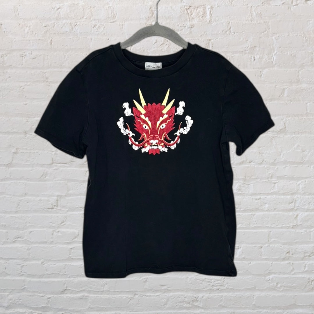 Black T-shirt with a bold red and yellow dragon graphic on the front, white outlining details.