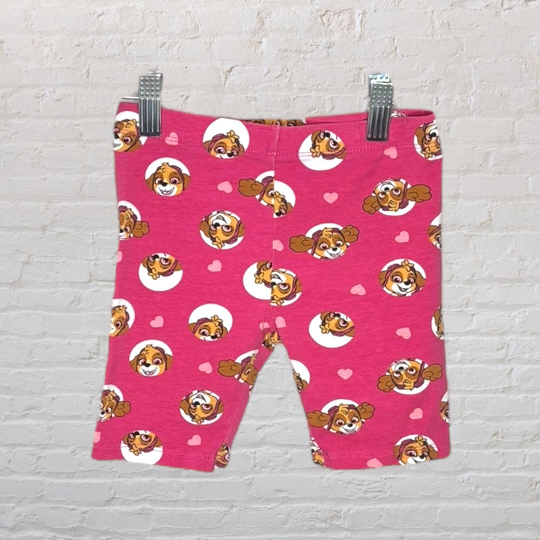 Pink cotton shorts with cartoon character print, including hearts, suitable for kids.