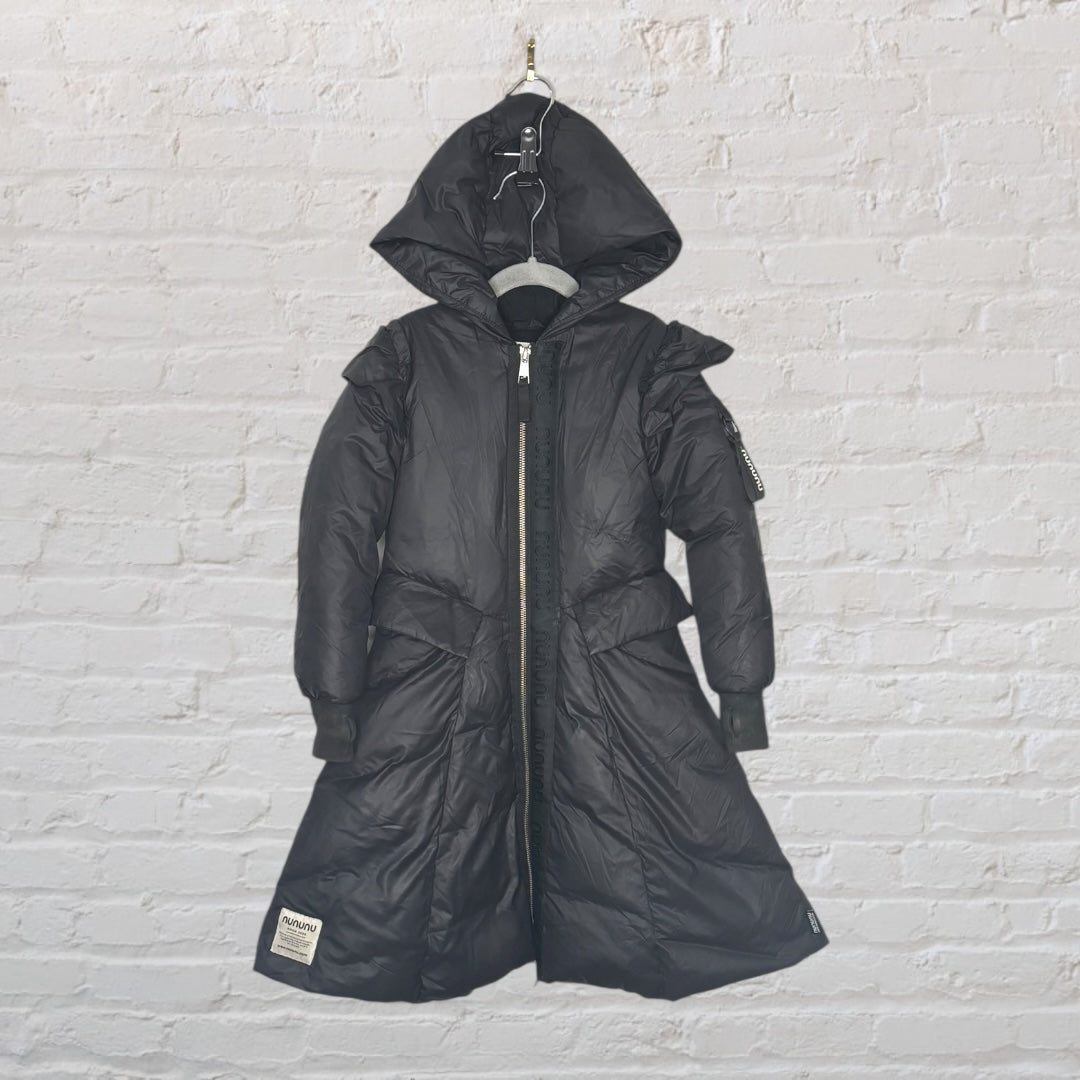 Black long quilted coat with hood and zip, featuring a Nununu patch on the hem.