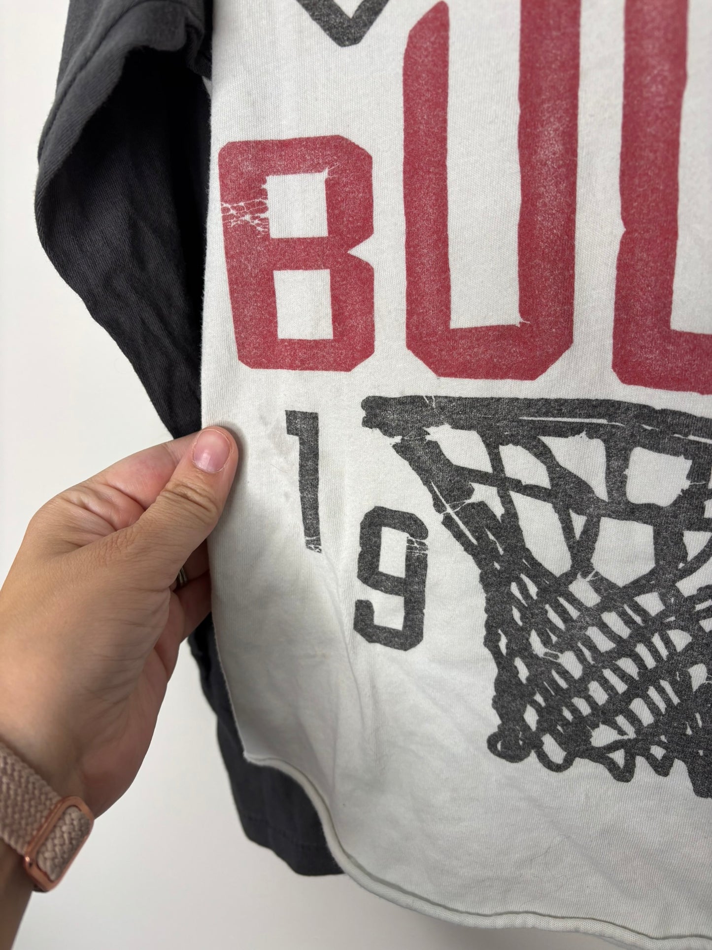Black and white raglan T-shirt with 'Chicago Bulls 1966' graphic, featuring a basketball net design.