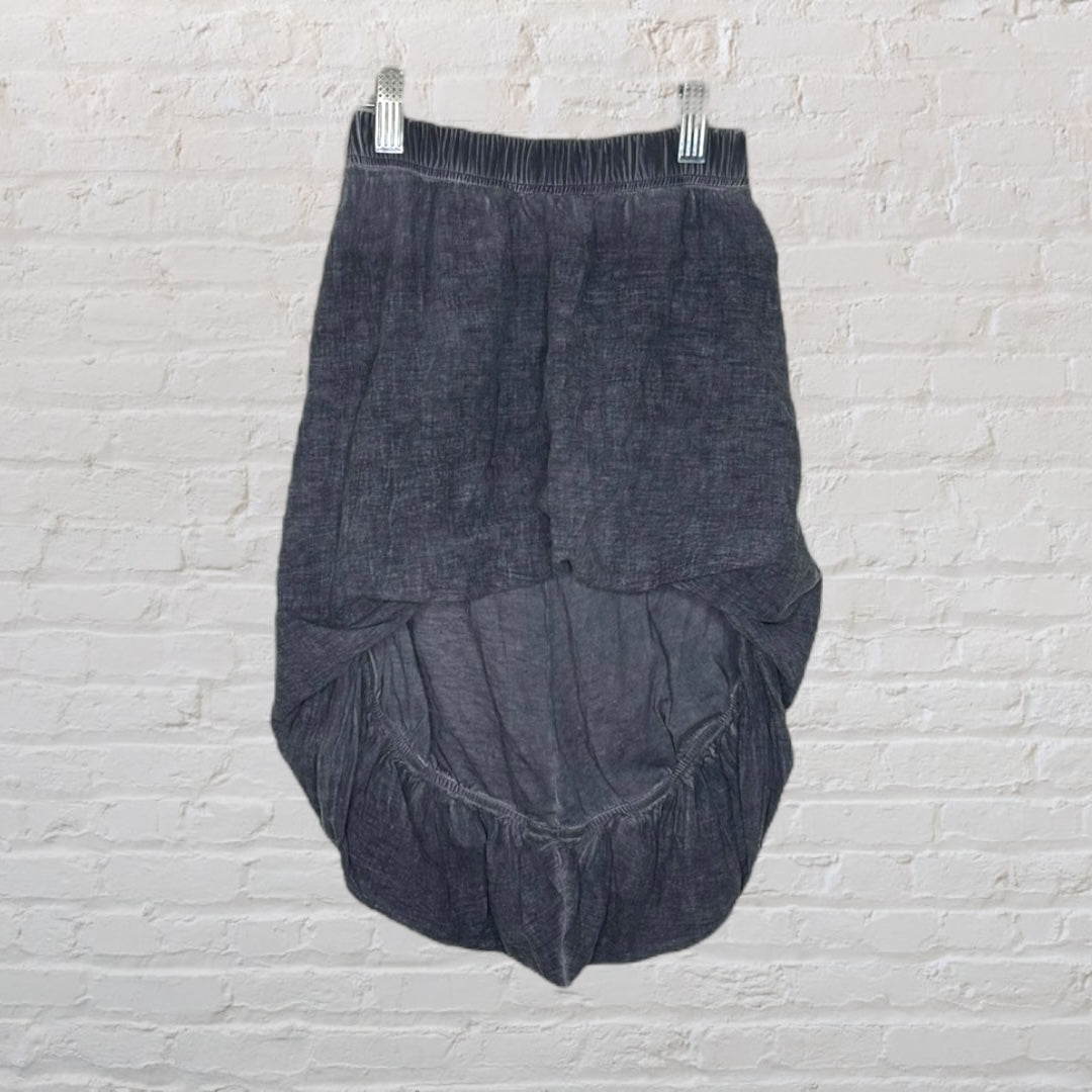 Dark gray asymmetric hem skirt with an elastic waistband, displayed on a hanger.