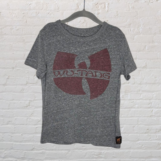 Heather grey T-shirt with a maroon Wu-Tang Clan logo, displayed on a hanger against a white brick wall.
