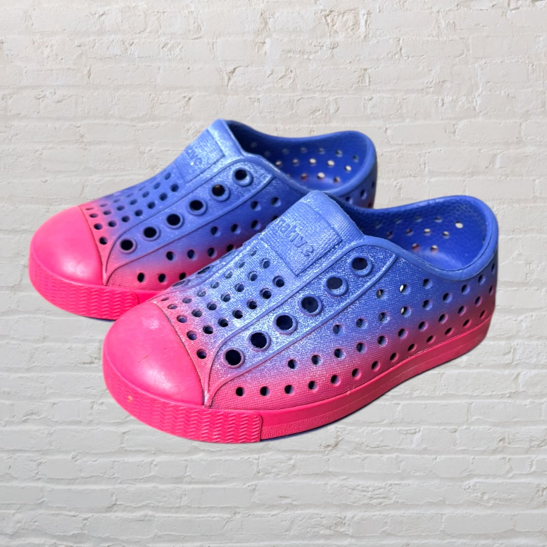 Blue and pink gradient slip-on perforated shoes by Native with a rubber sole.