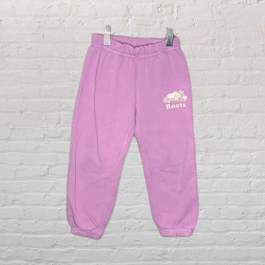 Lavender Roots sweatpants with beaver logo on the left thigh, featuring elastic cuffs and waistband.