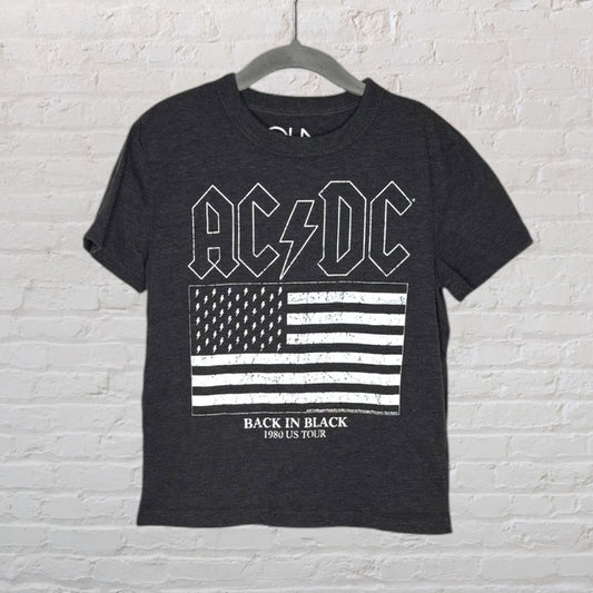 Charcoal AC/DC band T-shirt with 'Back In Black 1980 US Tour' and American flag graphic, hanging on a hanger.