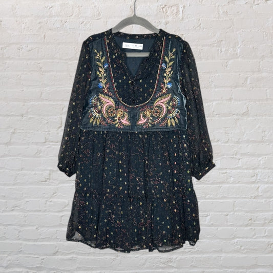Black boho dress with floral embroidery on the front, featuring long sleeves, by Zara, size M.