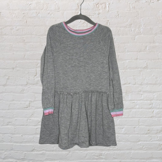 Gray long-sleeve dress with elastic waist and colored striped trim on the neckline and cuffs.