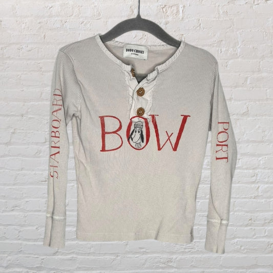 Bobo Choses light grey henley shirt with nautical terms printed in red, featuring buttons and long sleeves.