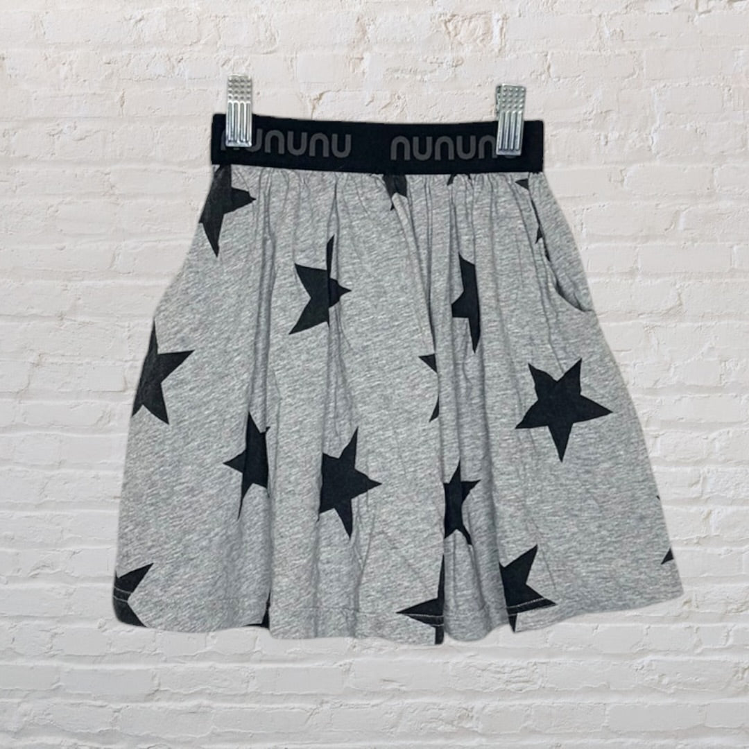 Grey skirt with black star pattern and a black Nununu logo waistband.