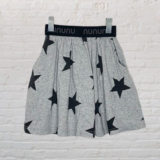 Grey skirt with black star pattern and a black Nununu logo waistband.