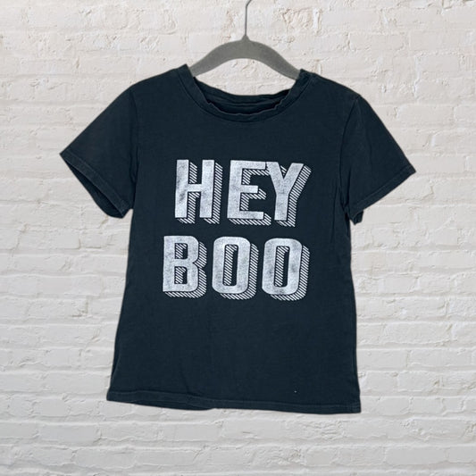 Black T-shirt with 'Hey Boo' text printed in bold white letters on a hanger.