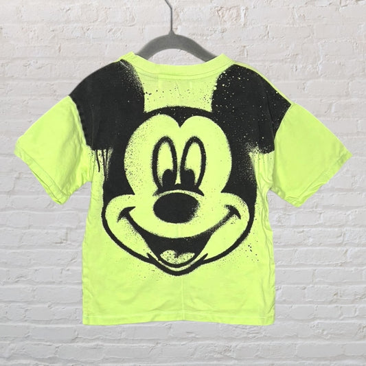 Neon yellow T-shirt featuring a large black graphic of Mickey Mouse's face.