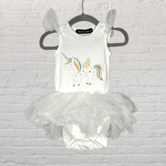 White unicorn bodysuit with a colorful graphic and sparkly tutu skirt, displayed on a hanger.