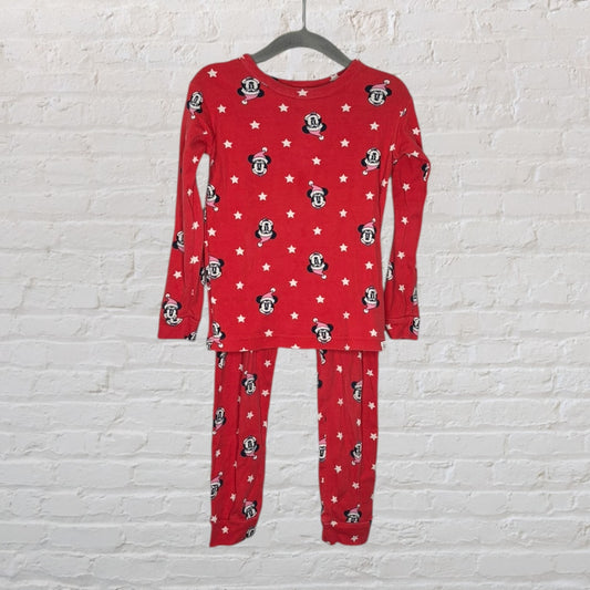 Red pajama set featuring Mickey Mouse and white stars, with long sleeves and pants, on a hanger.