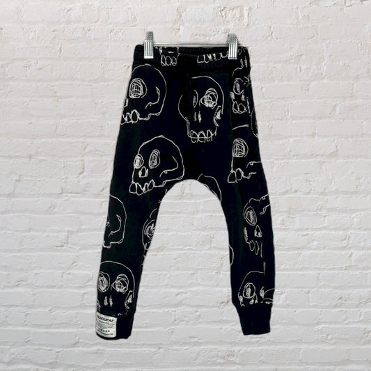 Black harem pants with white skull print, made by nununu.