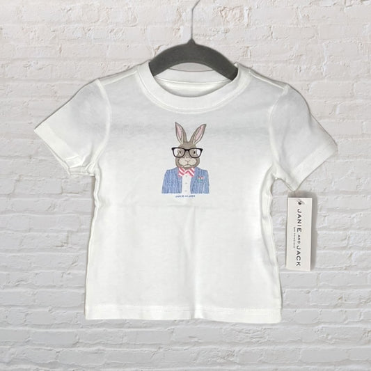 White Janie and Jack T-shirt with a bunny in glasses print, featuring a new tag, on a hanger.
