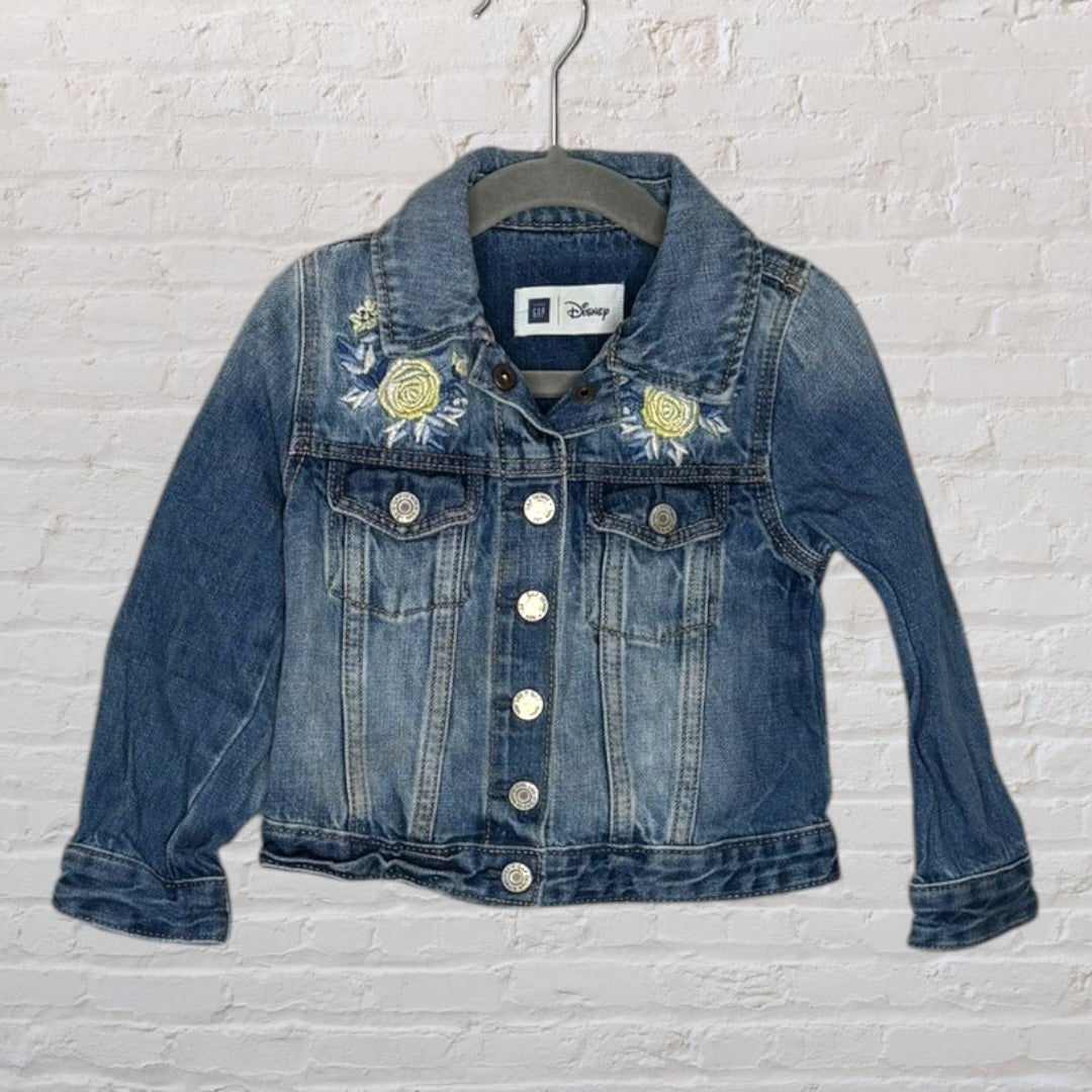 Blue denim jacket with 'Belle' embroidered on the back with a silhouette and rose design.
