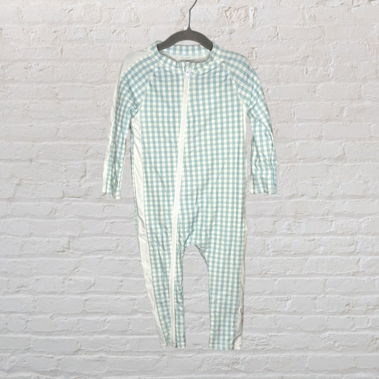 Light blue and white checkered one-piece suit hanging on a hanger.