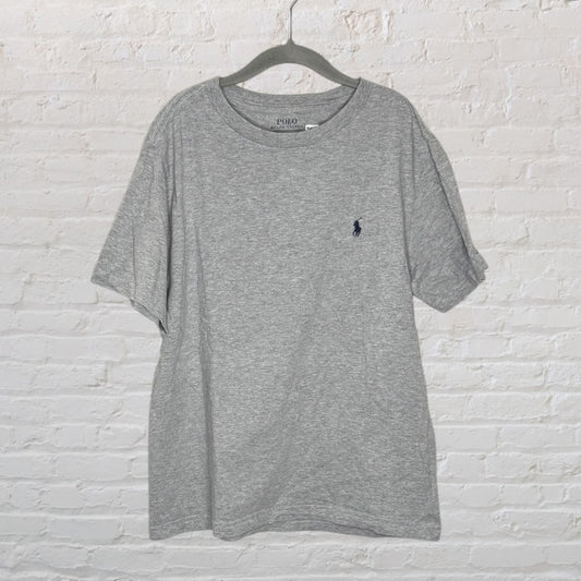 Heather grey Polo Ralph Lauren T-shirt with embroidered logo, displayed on a hanger against a white brick wall.