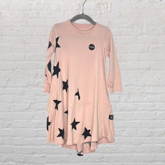 Pink tunic dress with black star prints by Nununu, featuring a relaxed fit and long sleeves.