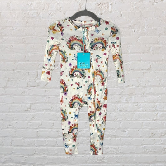 Posh Peanut one-piece with rainbow and butterfly print, shown on a hanger with a tag.