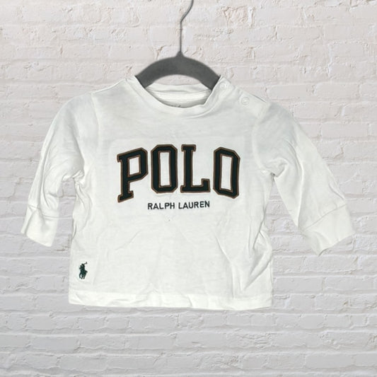 White baby long sleeve top with 'POLO RALPH LAUREN' printed on the front, featuring a side polo player logo.