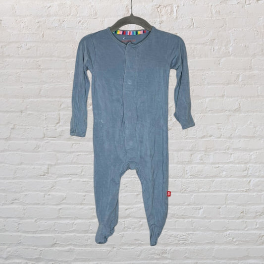 Blue baby footed sleeper with long sleeves displayed on a hanger.