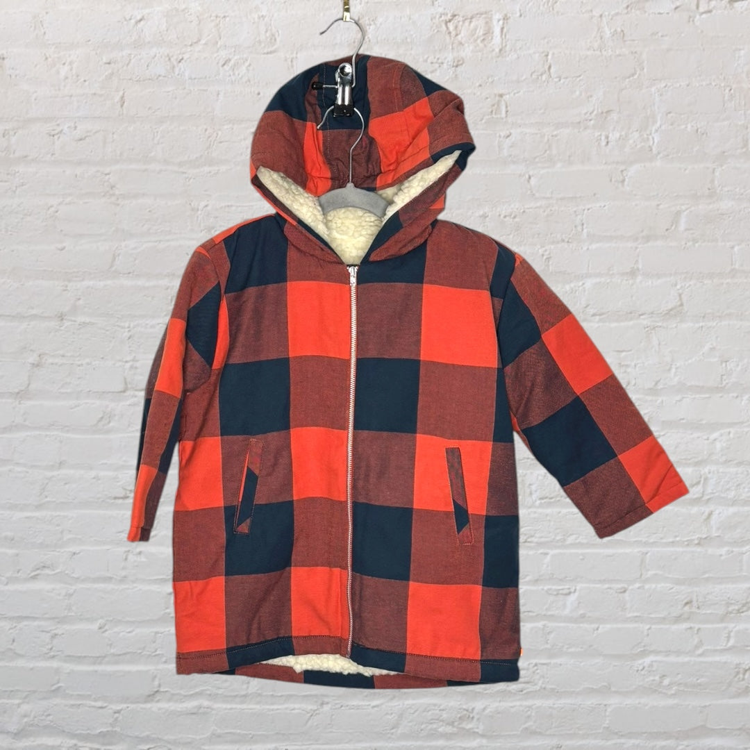 Plaid coat in red and black with a hood and zip closure, featuring side pockets and a warm lining.