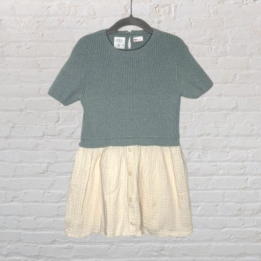Zara kids dress with knit green top and cream gauze skirt on a hanger.