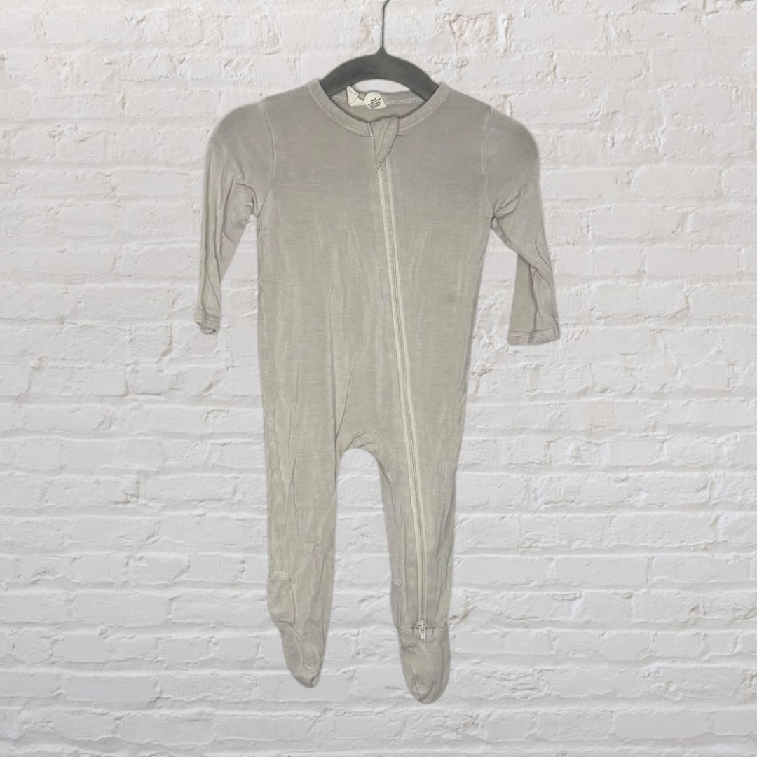 Light grey baby onesie with a zip-up front and footed design, hanging on a black hanger.