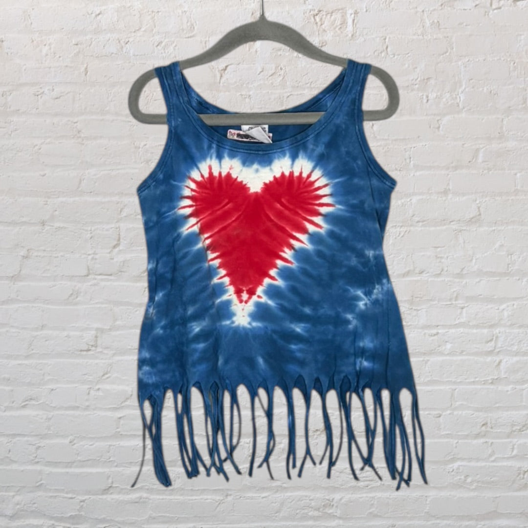 Blue tie-dye tank top with red and white heart design and fringe details at the hem, hanging on a hanger.