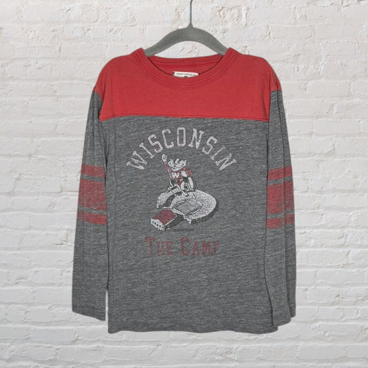 Grey and red long sleeve Wisconsin The Camp t-shirt featuring a graphic of a vintage mascot, displayed on a hanger.