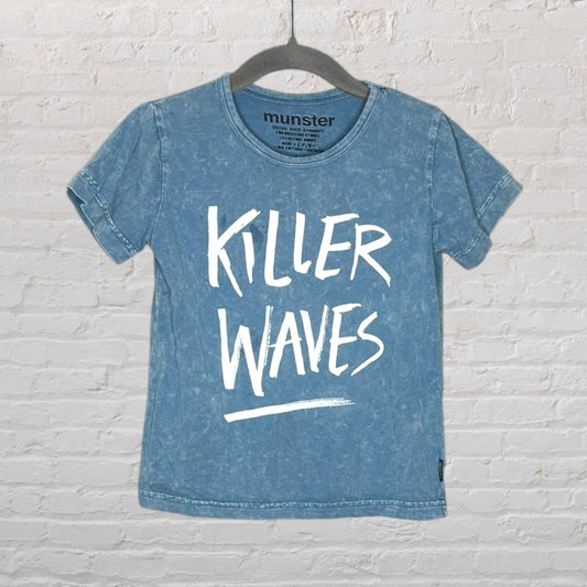 Munster washed blue T-shirt with 'Killer Waves' graphic, displayed on a hanger.