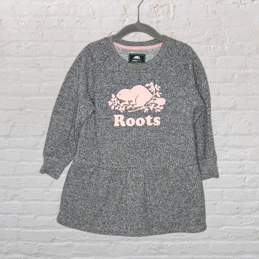 Heather grey long sleeve dress with pink Roots beaver logo, displayed on a hanger.