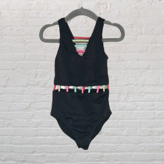 Black one-piece swimsuit with multicolor straps and cutout design, displayed on a hanger against a white background.