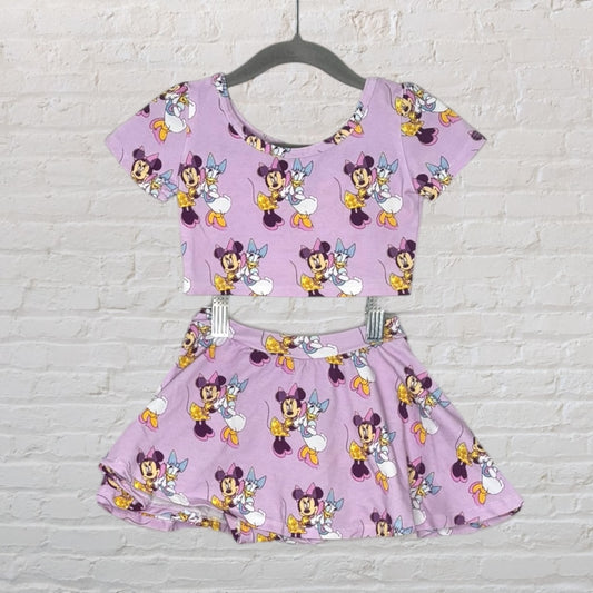 Lavender crop top and skirt set featuring graphics of Minnie Mouse and Daisy Duck.