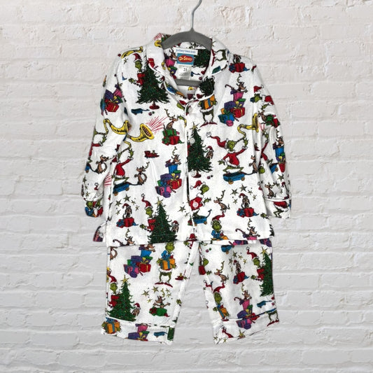 Children's pajama set featuring Dr. Seuss Grinch Christmas theme, with colorful prints on a white background, size 3T.