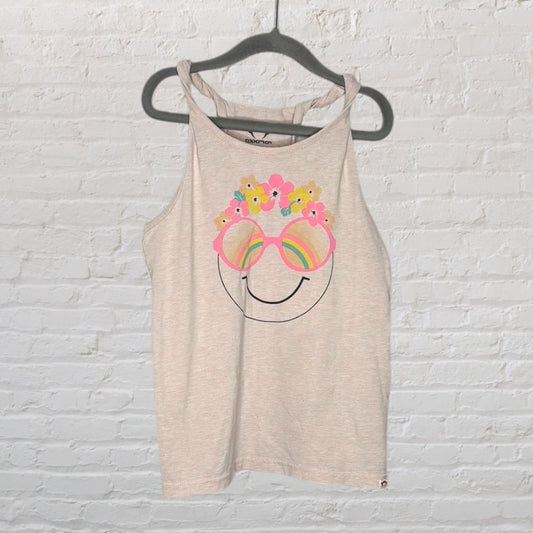 Light pink tank top with a graphic of a smiley face wearing rainbow sunglasses and floral decorations.