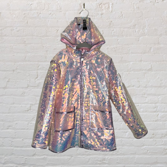 Holographic raincoat with sequins and hood, featuring front pockets, hanging on a hanger.