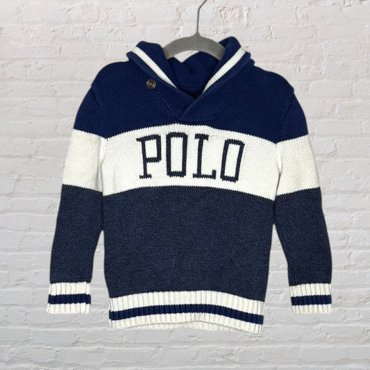 Navy and white knit sweater with 'POLO' logo and shawl collar, displayed on a hanger.