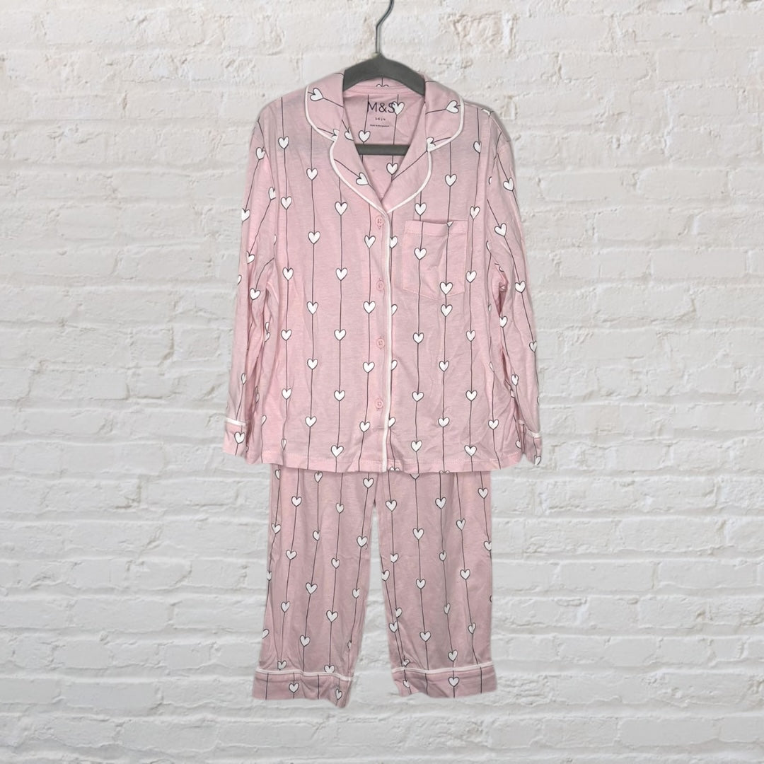 Pink pajama set with white heart patterns, featuring long sleeves and button-up top from M&S.