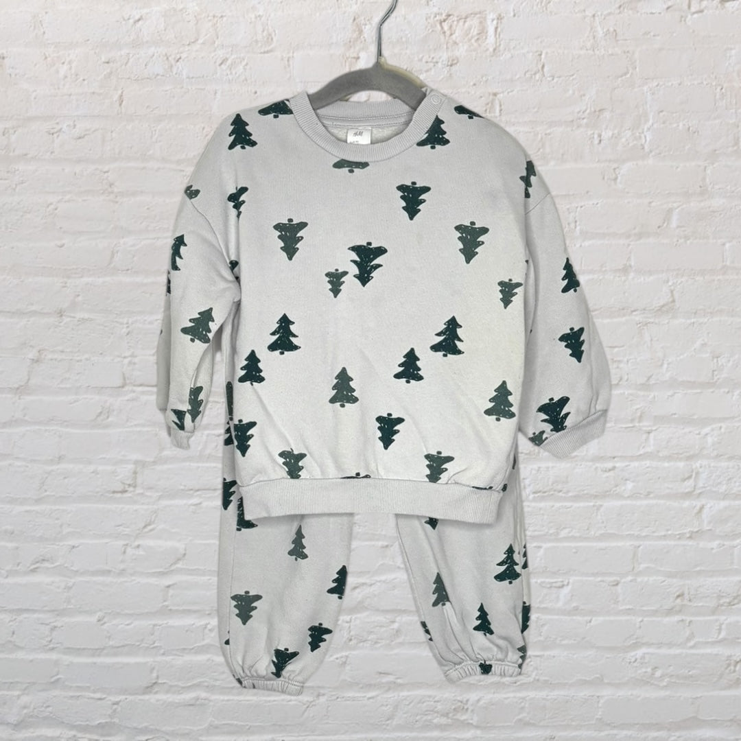 Light grey outfit set with dark green tree prints for kids, includes a long sleeve sweatshirt and pants.