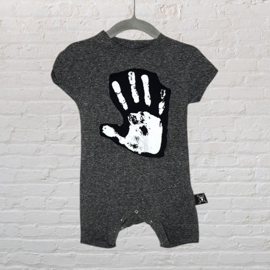 Gray baby romper with a large white handprint graphic on the front, displayed on a hanger.