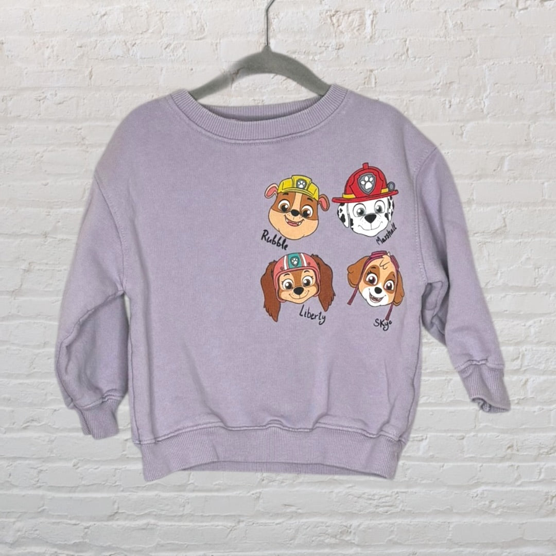 Lavender sweatshirt featuring Paw Patrol characters Rubble, Marshall, Liberty, and Skye.