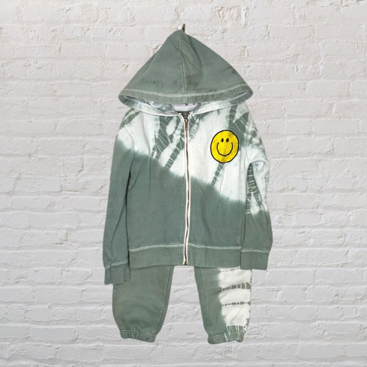 Green and white tie-dye hoodie and jogger set with a smiley face patch on the hoodie.