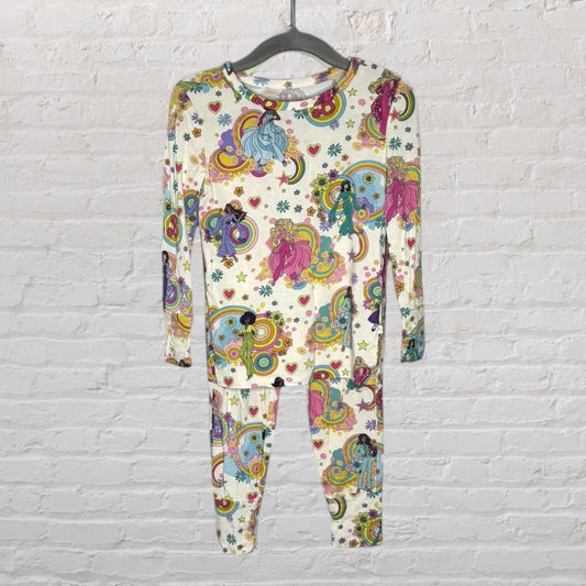 A colorful children's pajama set featuring rainbow and character patterns on a white background.